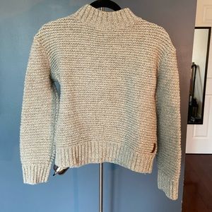 Small Roots mock neck knitted sweater.